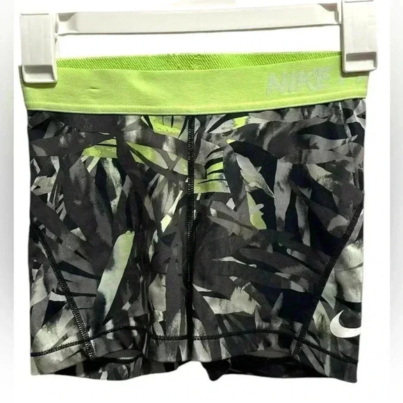 NIKE GRAY AND GREEN SPANDEX SHORTS - Picture 1 of 3